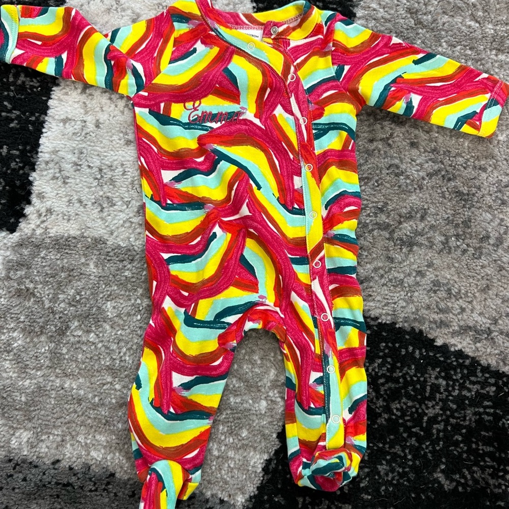 Newborn onesie with embroidered “Emma”